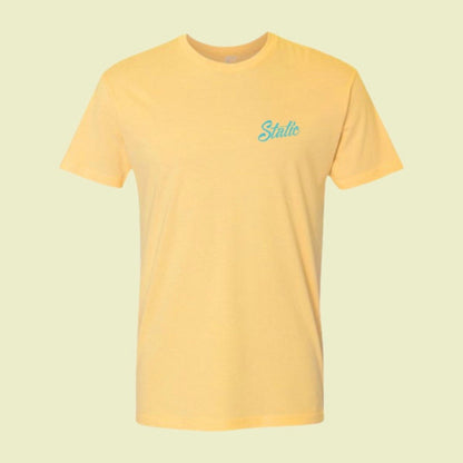 front of the yellow breakfastball golf inspired tee shirt with blue static golf script logo on chest. 